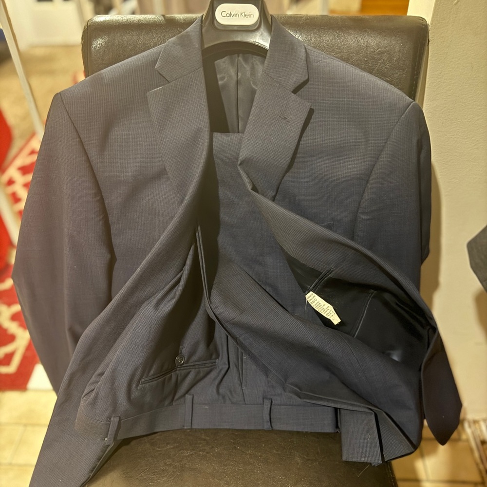 Calvin Klein 44 regular     Pants 36.  Inseam 32